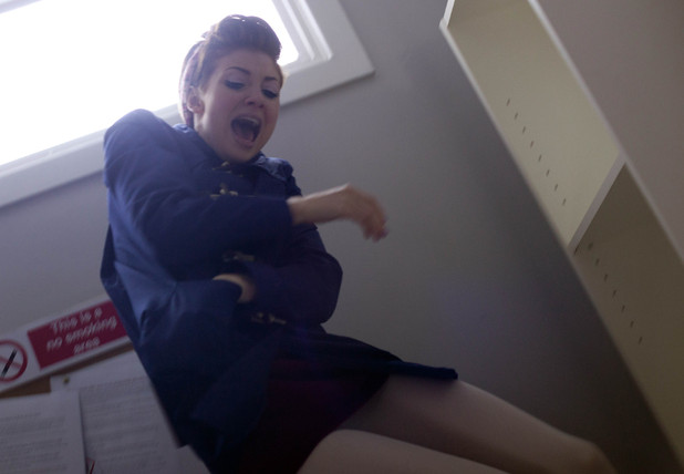 Tilly falls as she tries to escape.