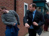 Tyrone rushes over to break the fight up as Tommy brawls with the other man