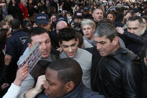 Zayn Mailik and Niall Horan,
of boy band One Direction mobbed by hundreds of hysterical fans as they arrive by Eurostaer at Gare Du Nord. The are in the french capital only for a few hours to appear on TV show Le Grand Journal on Channel Canal+.
Paris, France - 20.02.12