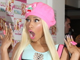 Nicki Minaj signs copies of her new album 'Pink Friday: Roman Reloaded' at HMV