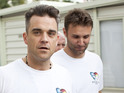 Soccer Aid England captain Robbie Williams and Jonathan Wilkes meet children at a shelter in Mexico City