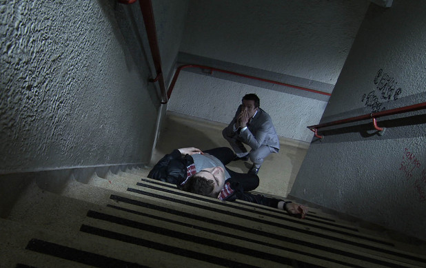 Brendan looks on at Joel's lifeless body.