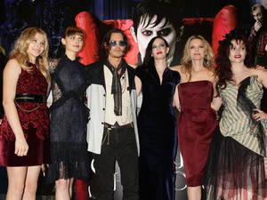 Chloe Moretz, Bella Heathcote, Johnny Depp, Eva Green, Michelle Pfeiffer and Helena Bonham Carter arriving at the Dark Shadows UK film premiere at the Empire Leicester Square, London.