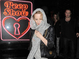 Kylie Minogue cuts a rather awkward figure, as she leaves La Bodega Negra restaurant in Soho. The eaterie shares its entrance with a sex shop, but it was unclear if this was why the princess of pop was hiding from snappers, or because she did not want to get wet. She was with a large of group of friends, including a long haired male, who she went onto Embassy Club with.
London