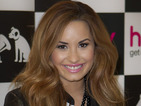 Demi Lovato's X Factor USA deal is said to be much less than Britney's.