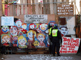Police at the entrance to Dale Farm