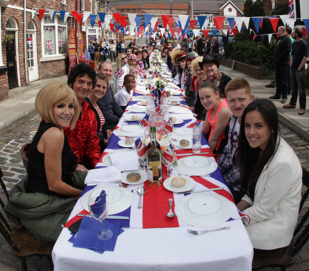 The Coronation Street residents gather round the table to celebrate the Queen's jubliee