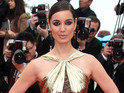 Berenice Marlohe poses on the red carpet.