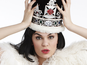 Jessie J wears a fur coat and a crown