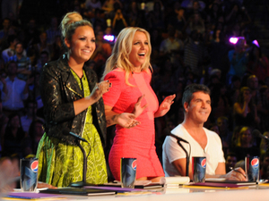 Demi Lovato, Britney Spears and Simon Cowell on the set of The X Factor USA