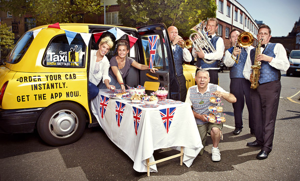Colin 'The Cabbie' Sinclaire and a brass band at his black cab Diamond Jubilee street party
