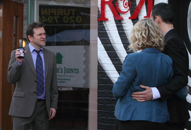 Michael is taken down to the police station for questioning on allegations of fraud.