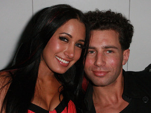 Jonny Manfre aka Jonny 'The Unit' Manfre with girlfriend Amia Miley