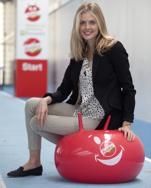 Donna Air sat on a Babybel spacehopper for Barnado's