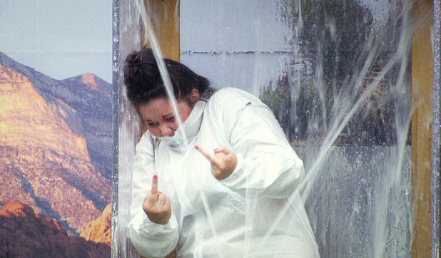 Becky being sprayed with fish guts 