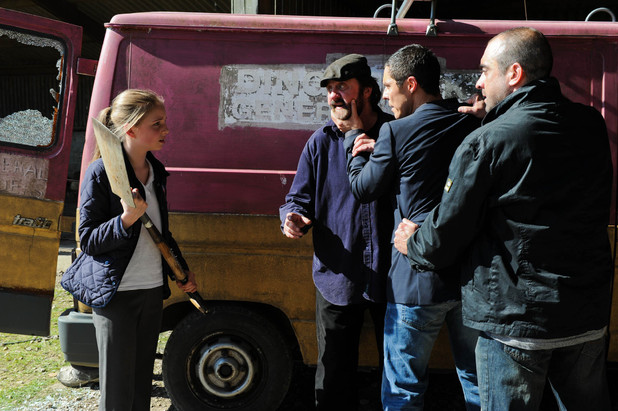 Belle is forced back into the van