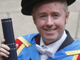 Filmmaker Mark Millar is pictured after receiving an honorary degree from Glasgow Caledonian University on Buchanan in Glasgow.