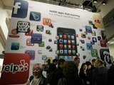 A poster touting apps available for the Apple's iPhone and iPod touch is seen at the Macworld Conference and Expo in San Francisco, Tuesday, Jan. 6, 2009
