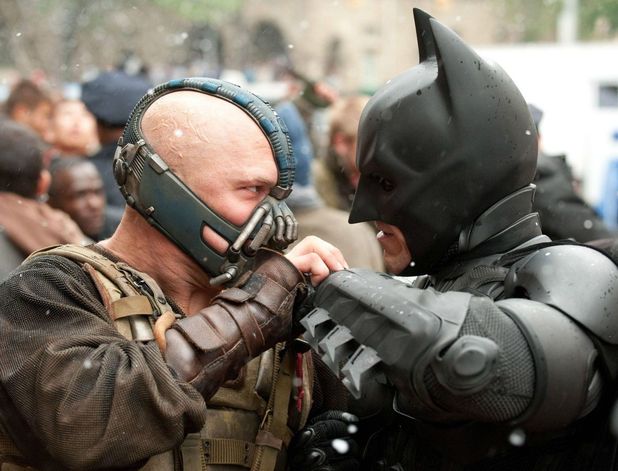 Batman (Christian Bale) in battle with Bane (Tom Hardy) in the The Dark Knight Rises