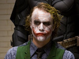 Christian Bale as Batman/Bruce Wayne and Heath Ledger as The Joker in The Dark Knight