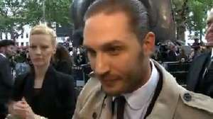 'The Dark Knight Rises' stars on Christopher Nolan