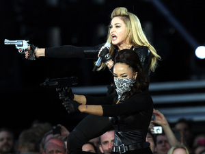 Madonna performs on stage in Hyde Park, London, as part of her MDNA tour