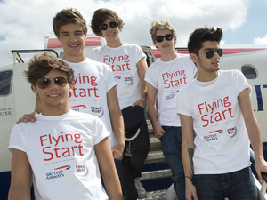 One Direction ready to board their flight.