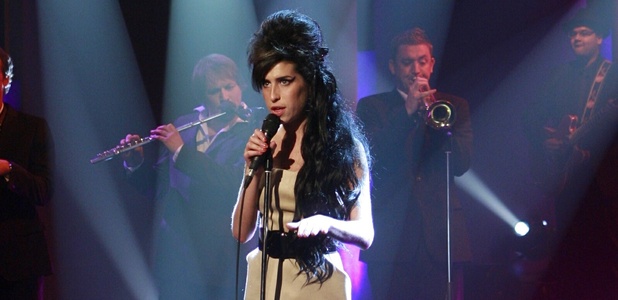 Amy Winehouse on Parkinson's TV Programme . Singing on stage.