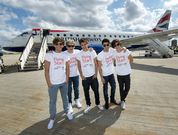 The boys in front of their private charter flight.
