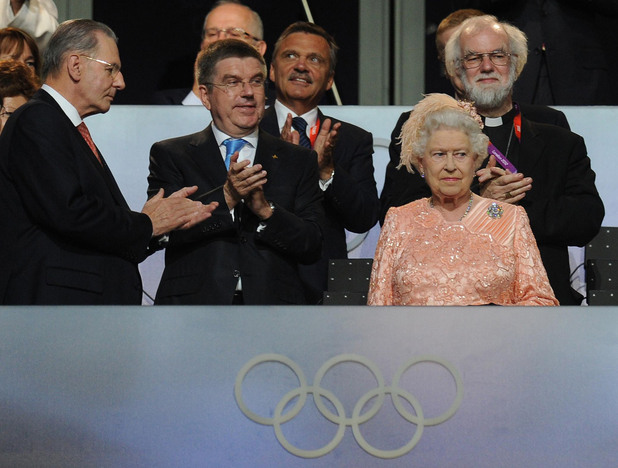 The Queen and IOC President Jacques Rogge arrive during the London Olympic Games 2012 Opening Ceremony.