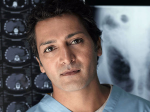 Hari Dhillon as Michael Spence in Holby City
