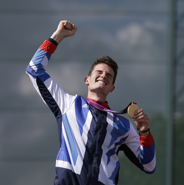 Peter Wilson punches the air as he celebrates his gold medal in the men's double trap shooting (August 2).
