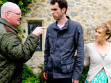 Emmerdale 6216: Paddy is furious, refusing to let Marlon mess up their lives while Rhona thinks they should get confirmation first that Marlon and Laurel really are together. Rhona urges Paddy to follow Marlon outside and Paddy is suspicious when he sees an exchange between Marlon and Laurel. In the pub kitchen, Paddy is angry as he questions Marlon about Laurel, wondering why he couldn't tell him. Marlon avoids the questions but panics when Paddy makes to leave. Marlon asks Paddy to keep the relationship quiet and they argue, both fuming about the situation. Later, Laurel and Marlon are left worried when Paddy visits and asks Marlon what is more important, them taking Leo away or keeping their affair a secret?