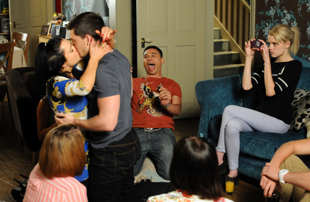 Whitney and Joey share a kiss.