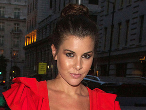 Imogen Thomas at Nobu Berkeley showing a small baby bump in her stunning red dress
London, England