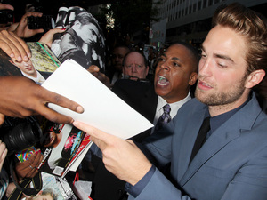 Robert Pattinson signs autographs, Cosmopolis NYC premiere, August 13 2012