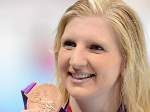 Great Britain's Rebecca Adlington celebrates with her bronze medal after finishing third in the Women's 400m Freestyle Final