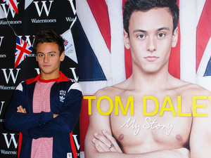 Olympic medalist, Tom Daley
signs copies of his autobiography 'My Story'
at Bluewater shopping center.
London