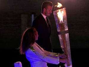 David Beckham arrives with the Olympic Torch on a boat at the ' Opening Olympic Ceremony ' . Shown on BBC 1 HD
England 