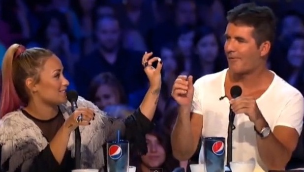 Demi Lovato and Simon Cowell on X Factor