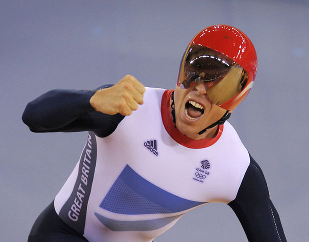 Great Britain's Sir Chris Hoy celebrates Gold in the team sprint final on the first day of the track cycling at the Velodrome in the Olympic Park.