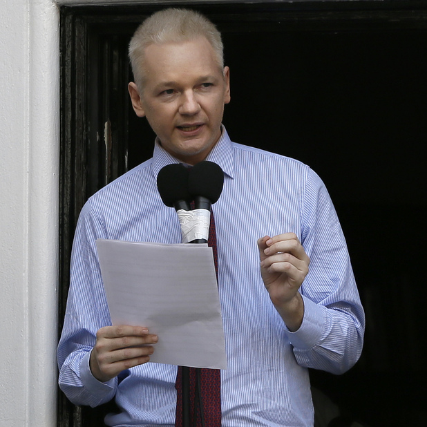 Julian Assange, founder of WikiLeaks makes a statement from a balcony of the Ecuador Embassy in London, Sunday, Aug. 19, 2012