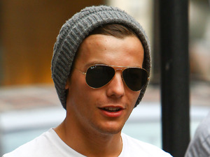 Louis Tomlinson
One Direction leave the BBC Radio 1 studios after being announced as the headline act for this years Radio 1 Teen Awards
London, England - 20.08.12
Mandatory Credit: WENN.com