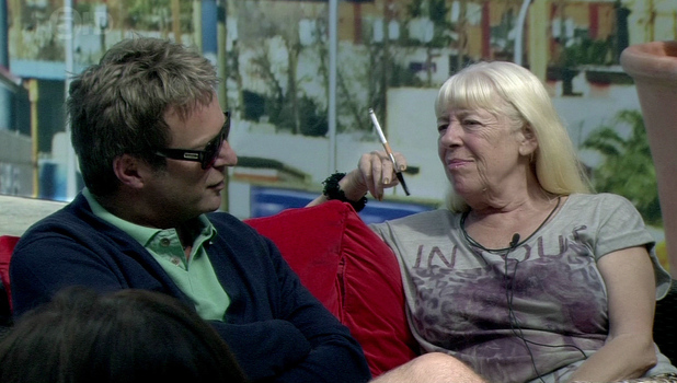 Julian Clairy and Julie Goodyear appear smoking in the garden on ' Celebrity Big Brother ' Shown on Channel 5 HDEngland - 24.08.12
Supplied by WENN.comWENN does not claim any ownership including but not limited to Copyright or License in the attached material. Any downloading fees charged by WENN are for WENN's services only, and do not, nor are they intended to, convey to the user any ownership of Copyright or License in the material. By publishing this material you expressly agree to indemnify and to hold WENN and its directors, shareholders and employees harmless from any loss, claims, damages, demands, expenses (including legal fees), or any causes of action or allegation against WENN arising out of or connected in any way with publication of the material.