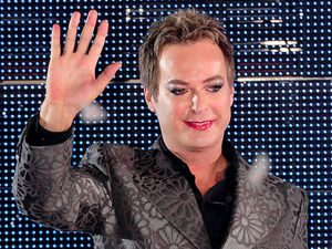 Julian Clary leaves the Celebrity Big Brother House as the winner during the live final at Elstree Studios, Borehamwood.
Picture date: Friday September 7, 2012. Photo credit should read: Ian West/PA Wire