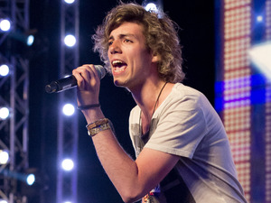 Eddy brings some rock to The X Factor stage.