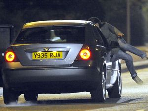 Having pushed Ryan to safety, Sophie is then hit by the speeding car