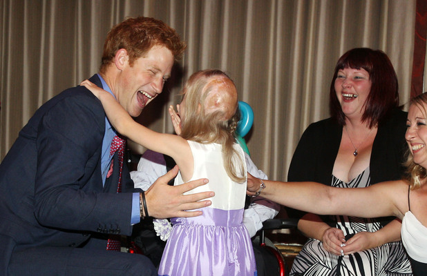 Prince Harry meets Hope Hillis as he attends the WellChild awards ceremony InterContinental Park Lane Hotel, London.
Picture date: Monday September 3, 2012. Alex, aged six, was interviewed by ITV News with his mother Debbie Logan ahead of the prize-giving event, and when asked what he would say to the royal replied: "I'm glad you've got your clothes on Prince Harry". See PA story ROYAL Harry. Photo credit should read: Lewis Whyld/PA Wire