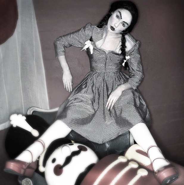 Lisa dressed as a doll in 'Britain & Ireland's Next Top Model'