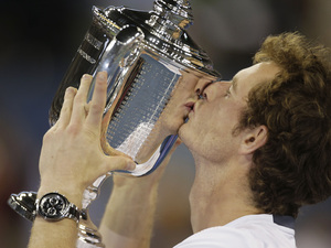 Andy Murray kisses the US Open trophy as he celebrates winning his first Grand Slam, September 10 2012